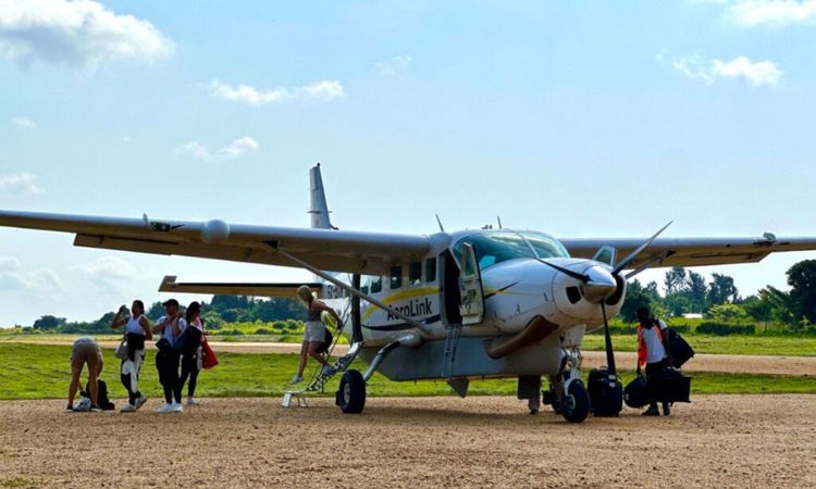 Can I fly between Uganda's national parks